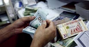 الدولار الأمريكي يرتفع أمام الدينار الليبي في التعاملات الرسمية