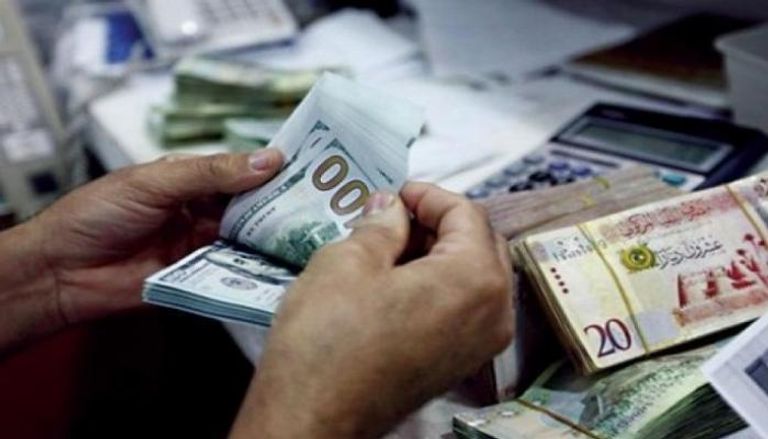 انخفاض العملة المتداولة خارج المنظومة المصرفية إلى 31.3 مليار دينار